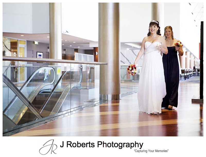 Bride departing for wedding from Novotel Darling Harbour - sydney wedding photography 